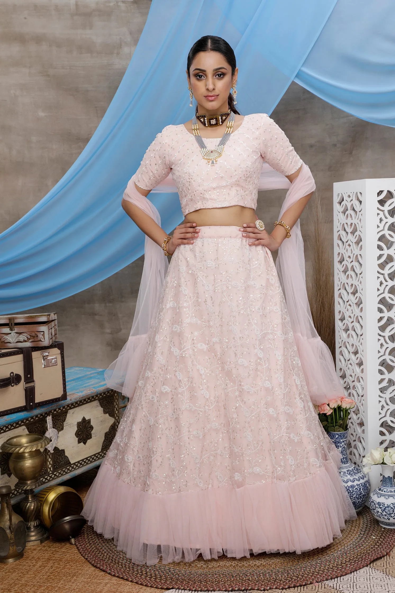 Peach Thread And Sequence Embroidered Net Semi Stitched Bridal Lehenga