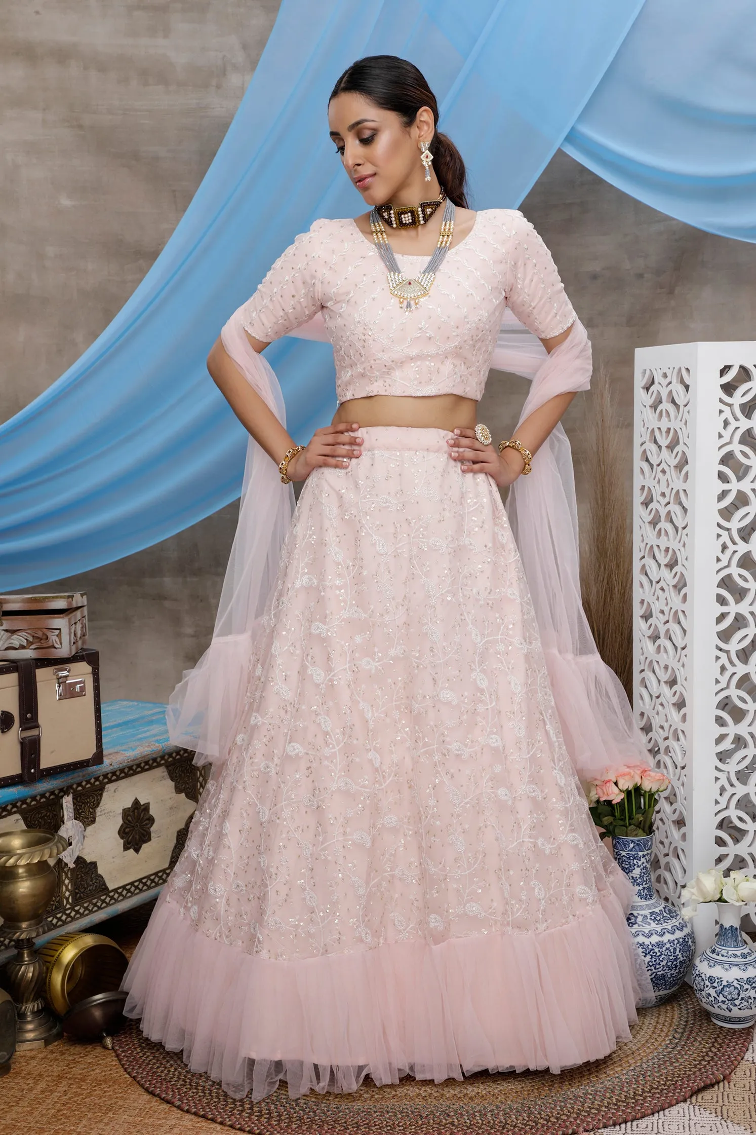 Peach Thread And Sequence Embroidered Net Semi Stitched Bridal Lehenga