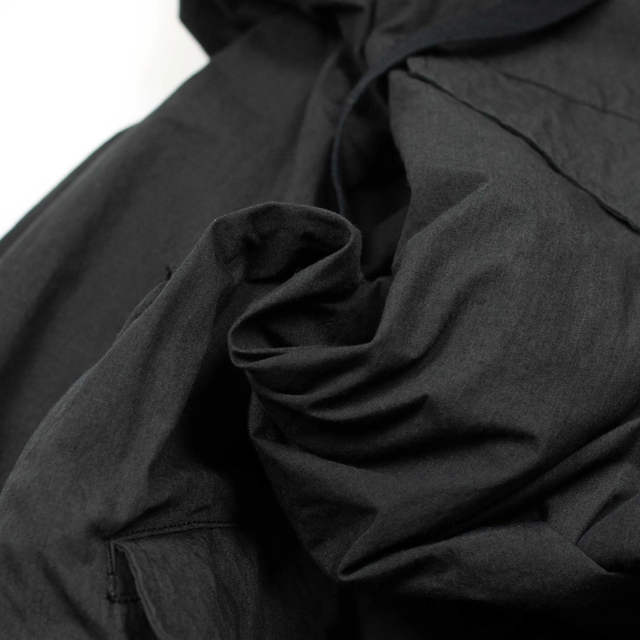 Reversible parka in anthracite high density cotton/nylon and black cotton/wool flannel