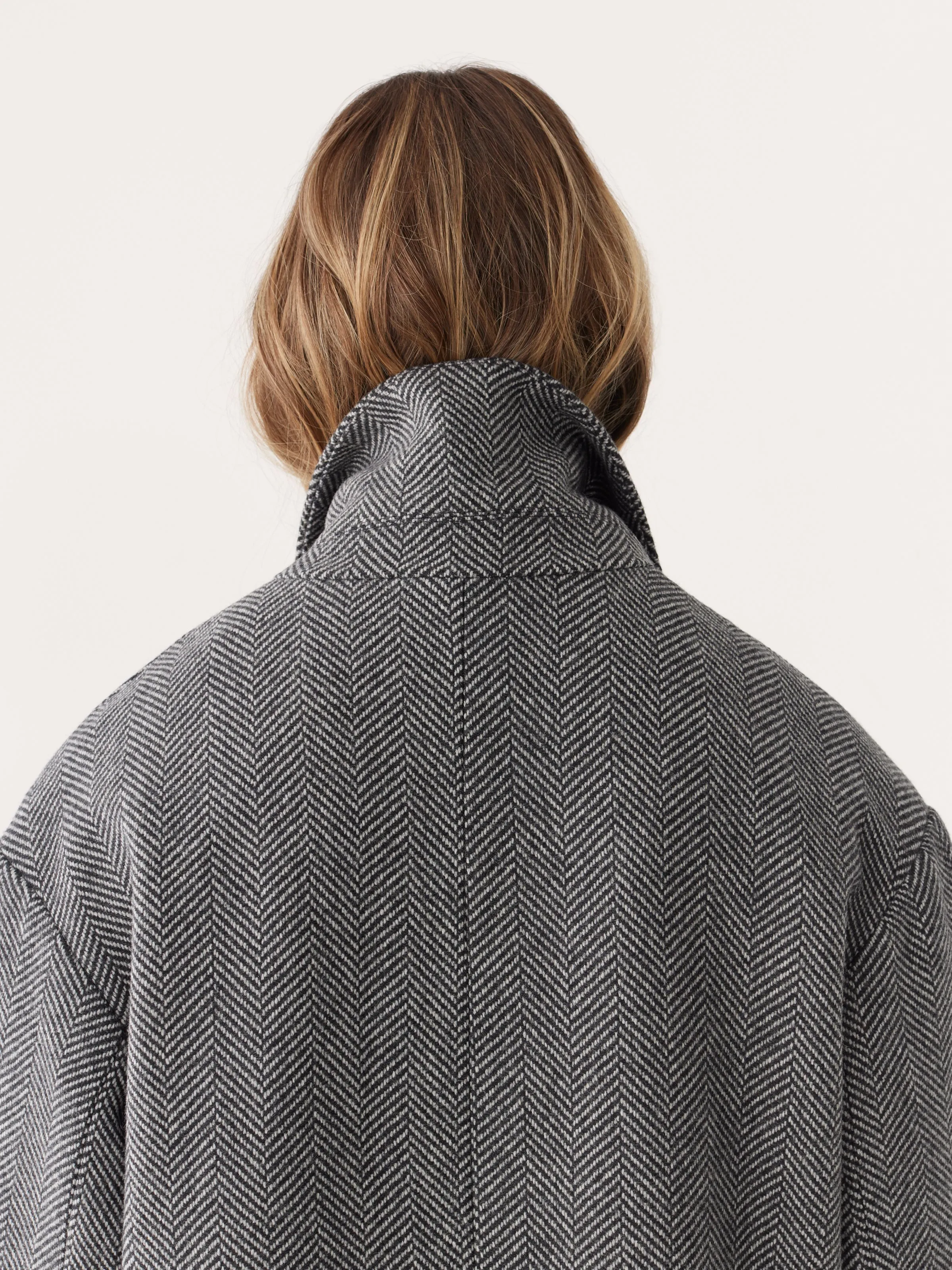 The Herringbone Recycled Wool Coat in Black